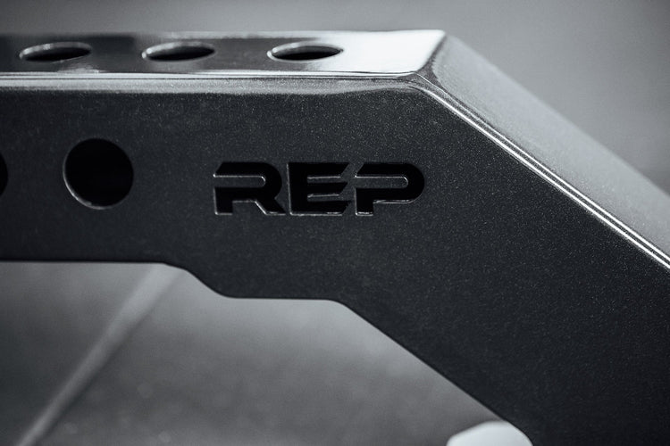 Close-up of Front Foot Extension Pair 2.0 with REP branding