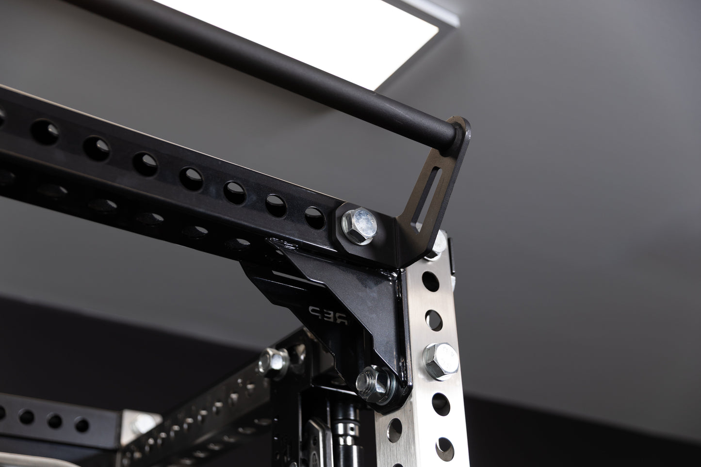Close-up of the REP Fitness Crossmember Pull-Up Bar on the front of a PR-5000 rack